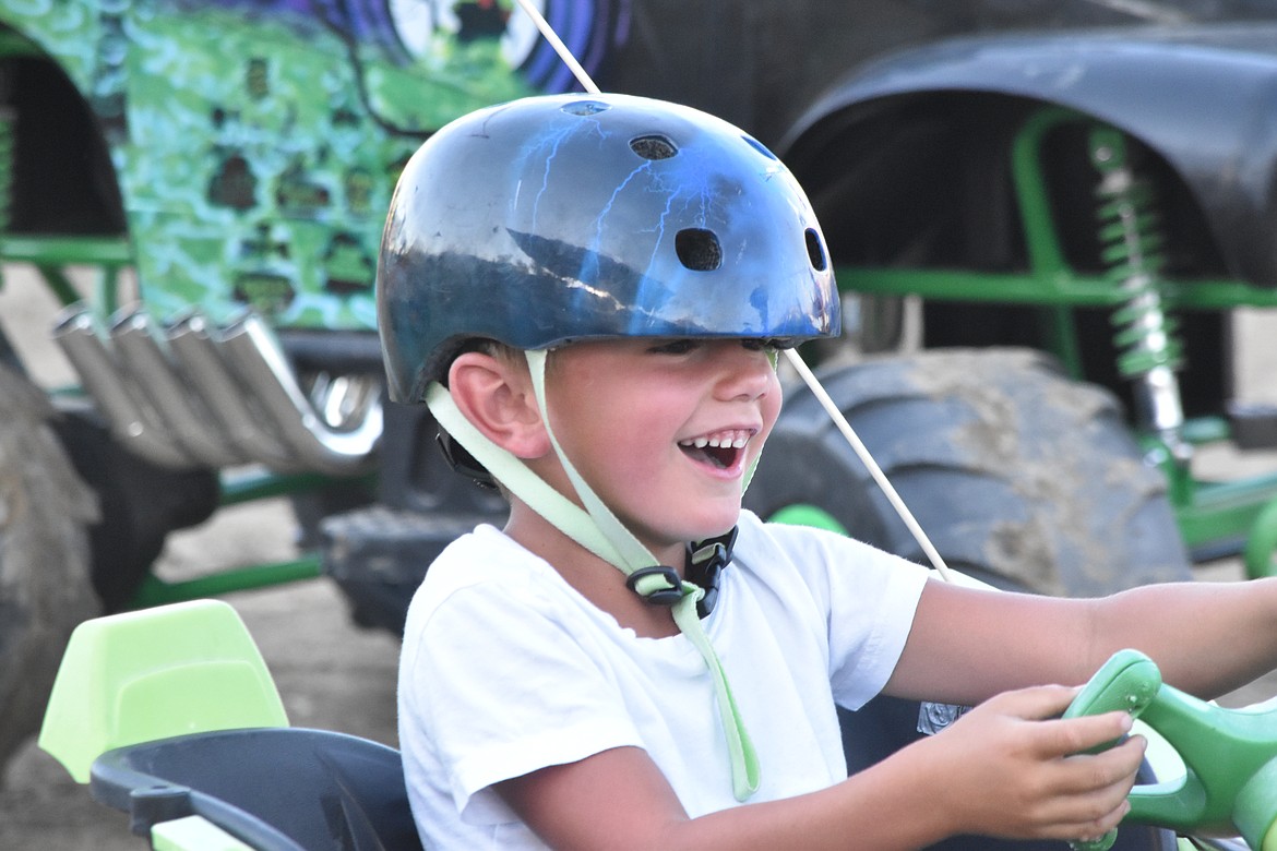 Smiles were abundant as the children enjoyed going at each other. While the vehicles didn’t speed along too dangerously, the drivers seemed satisfied with the event.