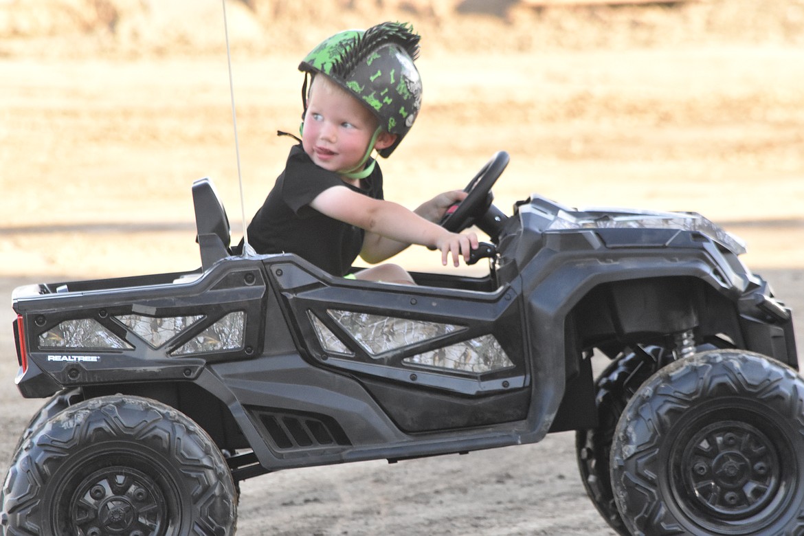 Children sported fun helmets to keep themselves safe while bonking into one another’s vehicles.