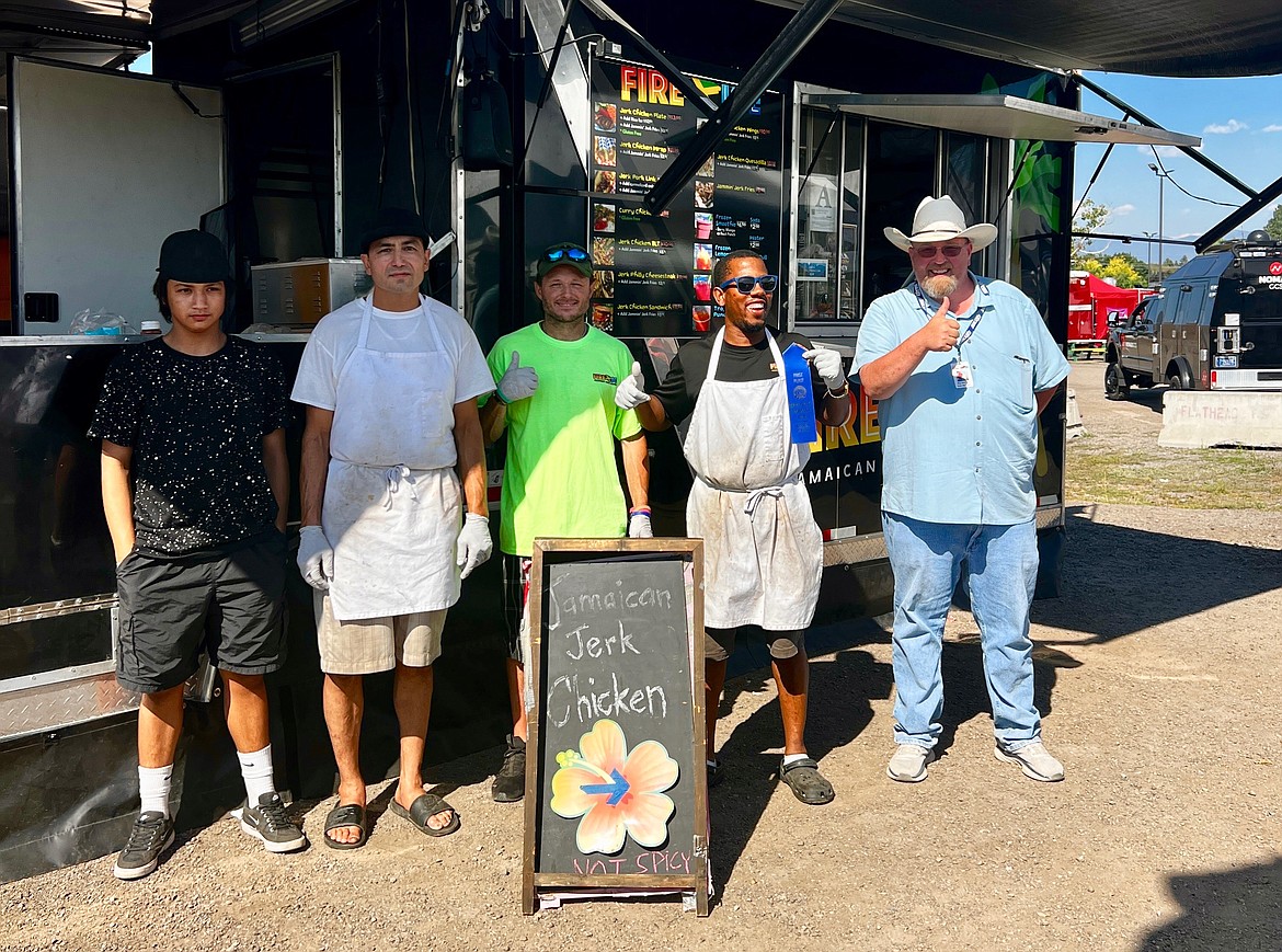 Best Food at the Fair winner Fire + Ice took the blue ribbon for their Jamaican jerk chicken. Pictured left to right are Garret Brown, Shilo Brown, KC Dally, Terace Stewart and Sam Nunnally.