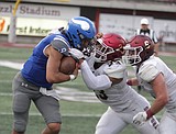 PREP FOOTBALL: A turning opener for Vikings