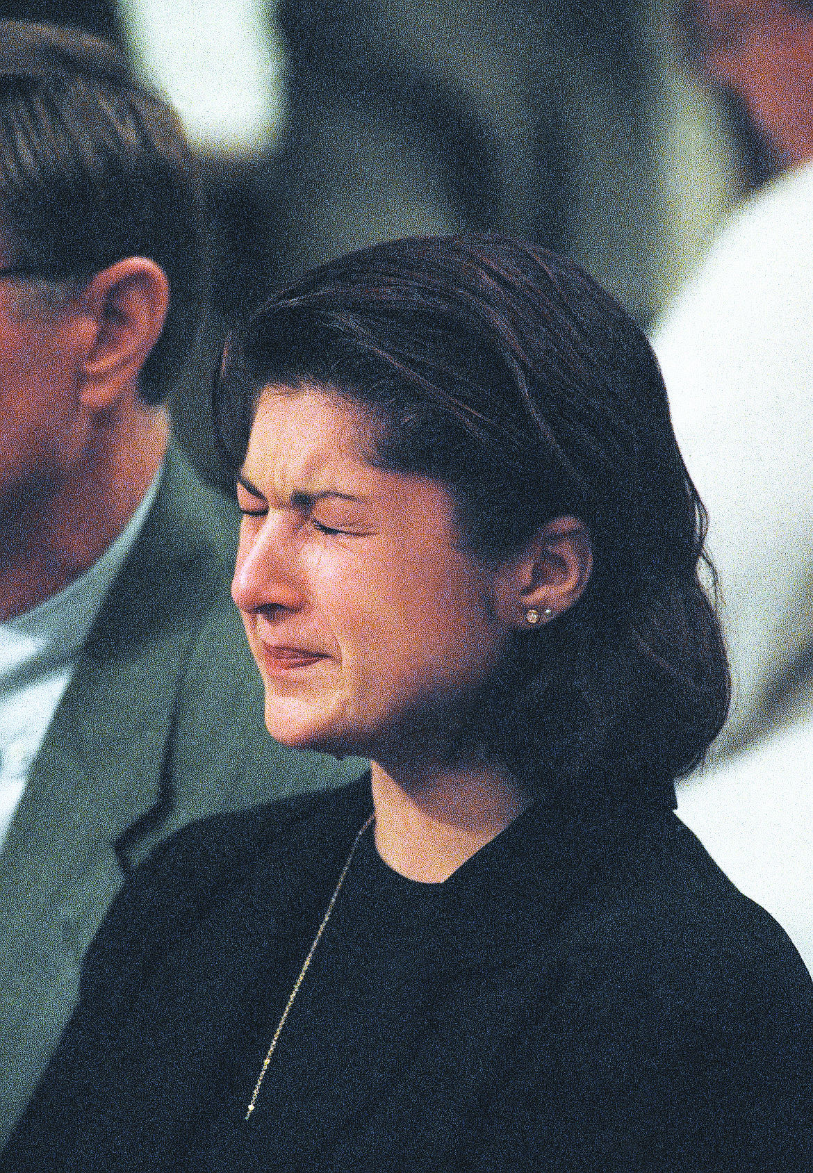 Tears stream down the face of Sara Weaver, daughter of white separatist Randy Weaver, as her father testifies on Capitol Hill in Washington, Sept. 6, 1995, before a Senate Judiciary subcommittee. Randy Weaver appealed to the subcommittee for “accountability for the killings of my wife and son” during a 1992 standoff with federal agents at his isolated cabin in Ruby Ridge, Idaho.