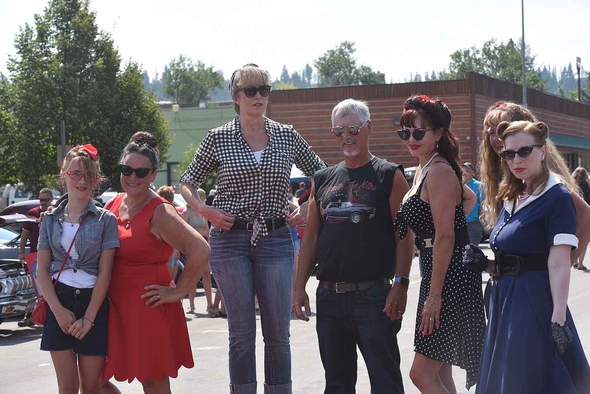 Participants in the Pin-Up Girl, RockaBetty and RockaBilly contests gathered for a photo at the Igniters Car Club show Saturday, Aug. 20, 2022, in Libby. (Scott Shindledecker/The Western News)