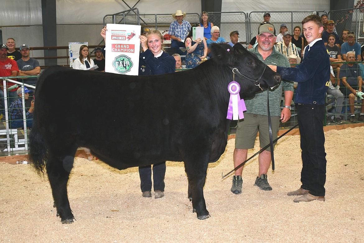 Dillon Jewett sold his grand champion steer to Sandry Construction for $7.75 per pound at the annual Market Livestock Sale at the Northwest Montana Fair on Saturday, Aug. 20, 2022. (Courtesy of Alicia Craft Gower)