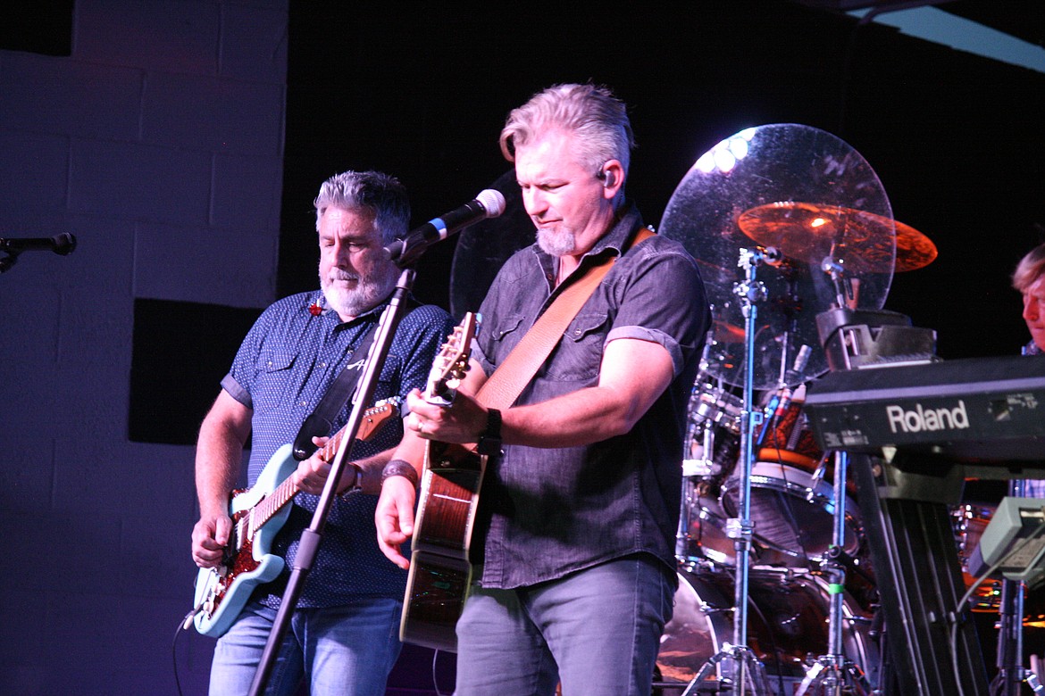 Michael Britt, left, and Drew Womak of Lonestar play on during the group’s concert in Moses Lake.