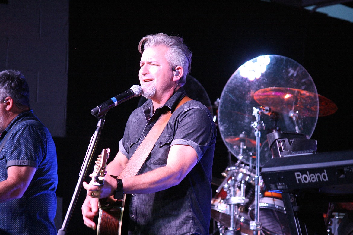Drew Womak of Lonestar at the microphone at the Moses Lake concert on Aug. 18.
