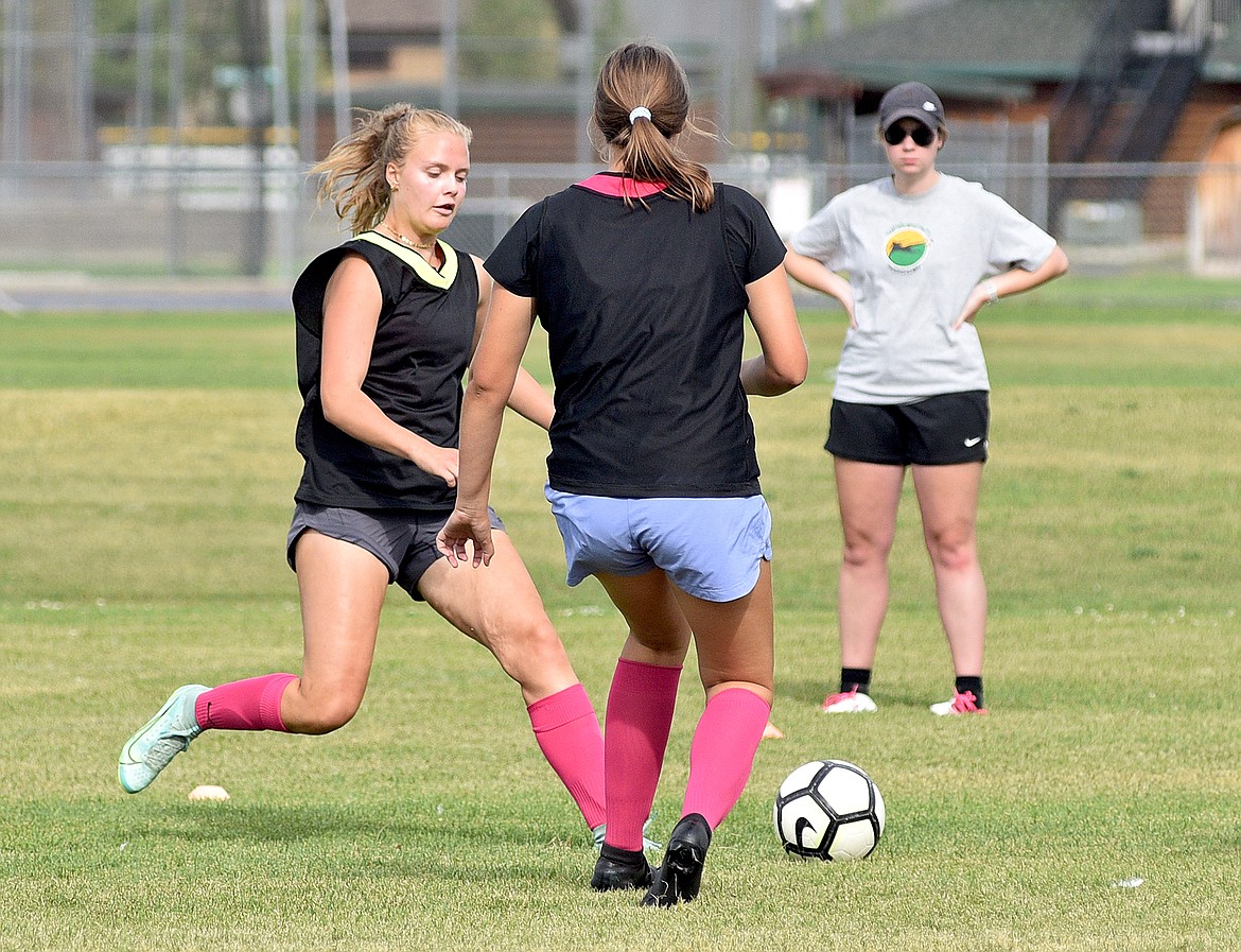 Whitefish junior Olivia Genovese gets to the ball during a drill at practice on Monday. (Whitney England/Whitefish Pilot)