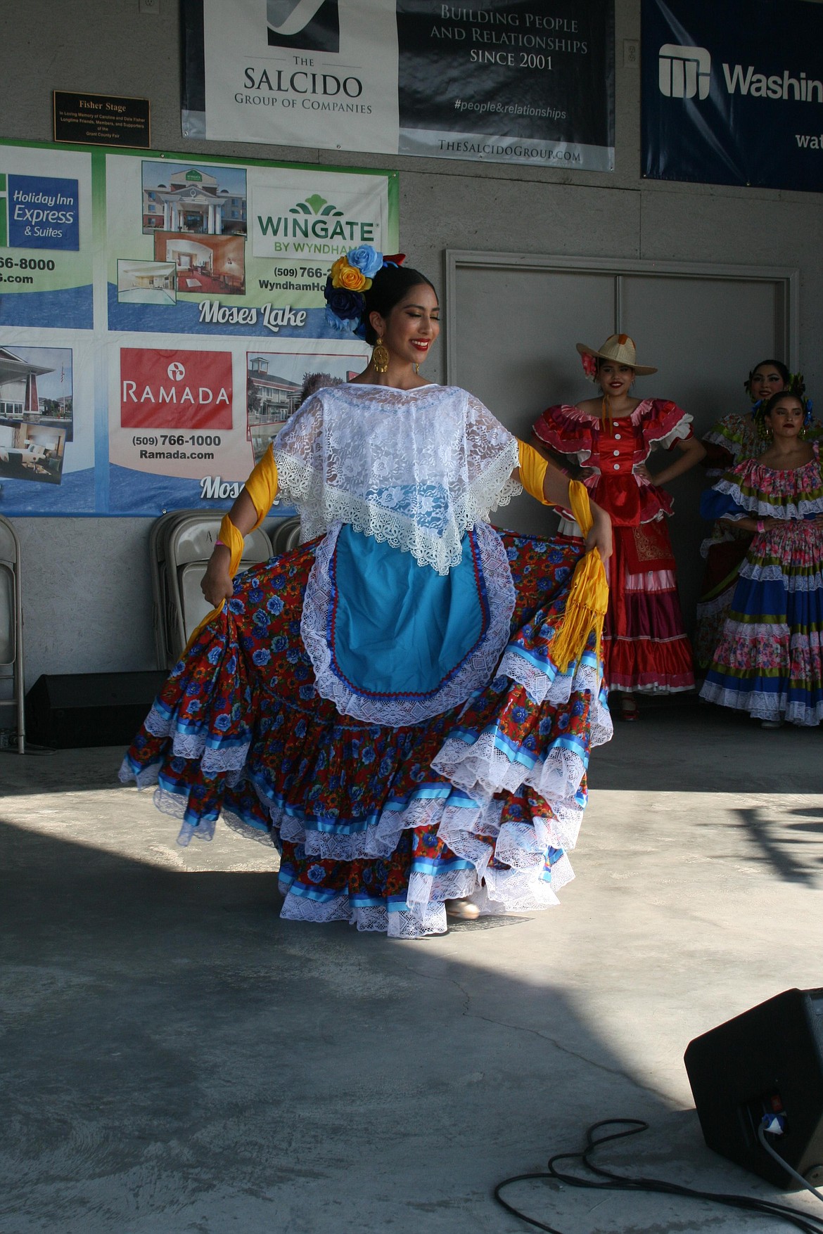 Ballet Folklorico Cielo de Mexico founder Gabriela Ramirez performs a traditional dance from the state of Vera Cruz during the group’s performance at the Grant County Fair Saturday.