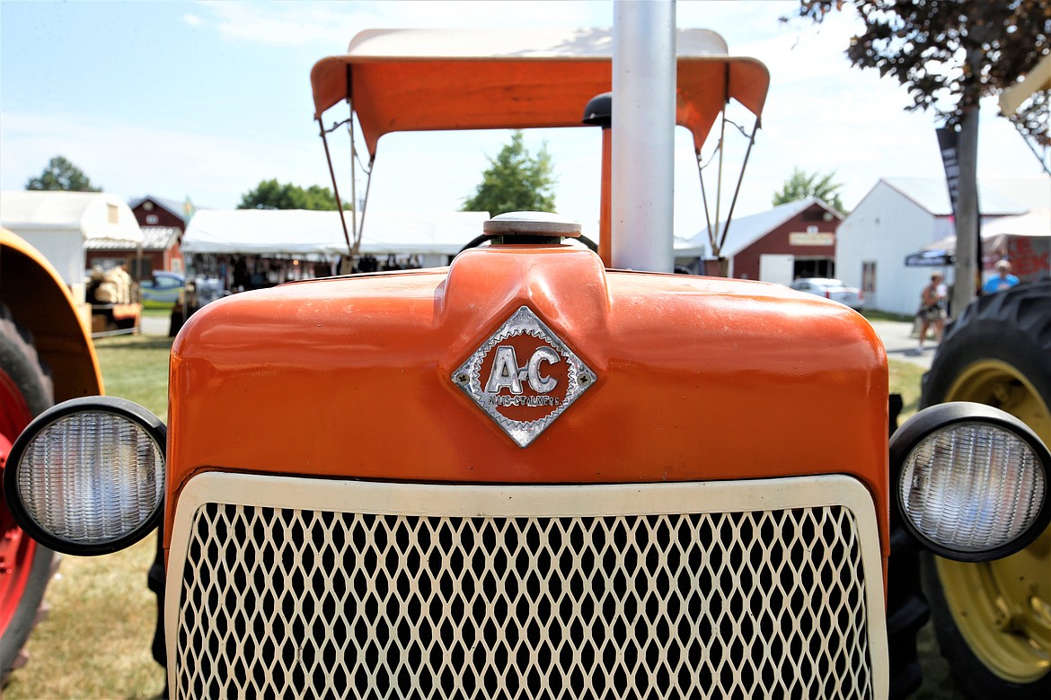 Old tractors are part of the vintage agricultural equipment display at the North Idaho State Fair.