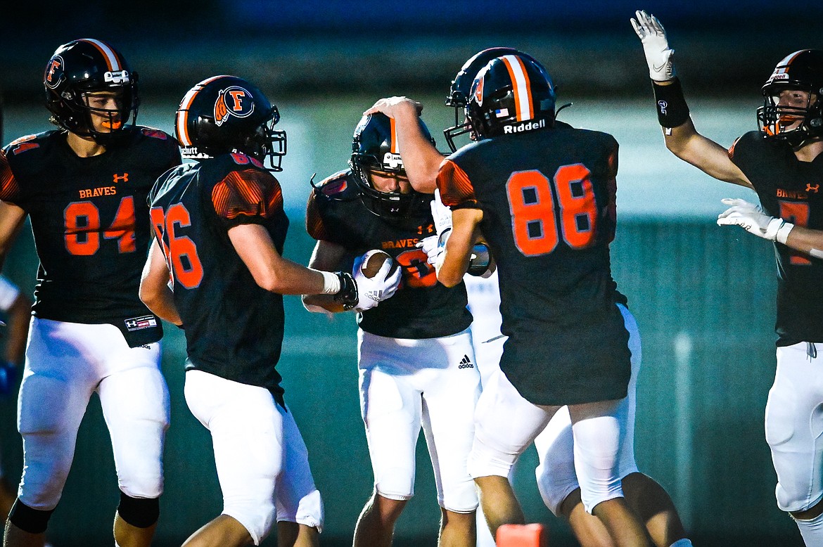 Flathead celebrates after wide receiver Ben Bliven (10) caught a touchdown reception in the fourth quarter against Billings Skyview at Legends Stadium on Friday, Aug. 26. (Casey Kreider/Daily Inter Lake)