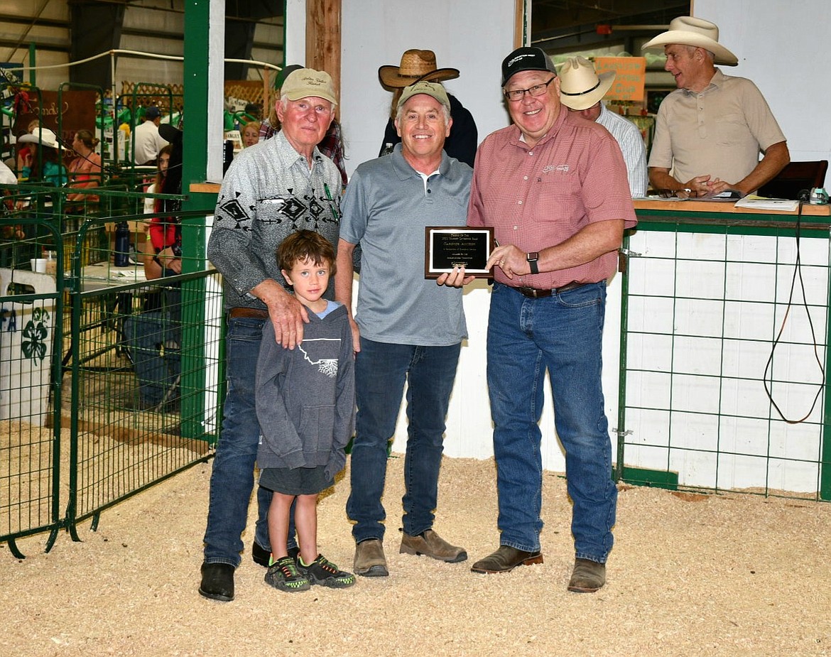 Gardner Auction Services was honored for their assistance with the annual Market Livestock Sale at the Northwest Montana Fair. (Courtesy of Alicia Craft Gower)