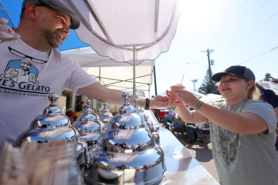 David Restivo of Dave’s Gelato hands out a cup of his tasty treats at the new Columbia Falls Farmers Market July 31. (Jeremy Weber/Daily Inter Lake)