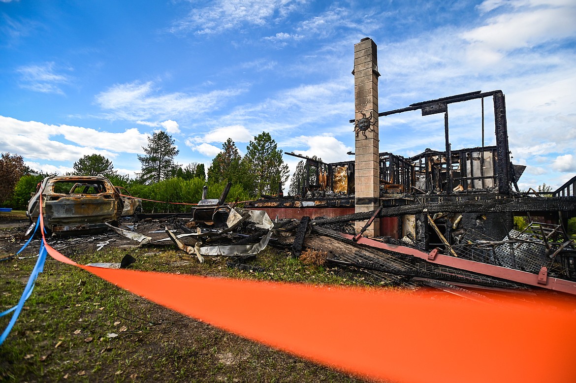 Fire destroyed the home and two automobiles belonging to the Brewer/Works family along Tronstad Road, shown on Saturday, Aug. 27. (Casey Kreider/Daily Inter Lake)