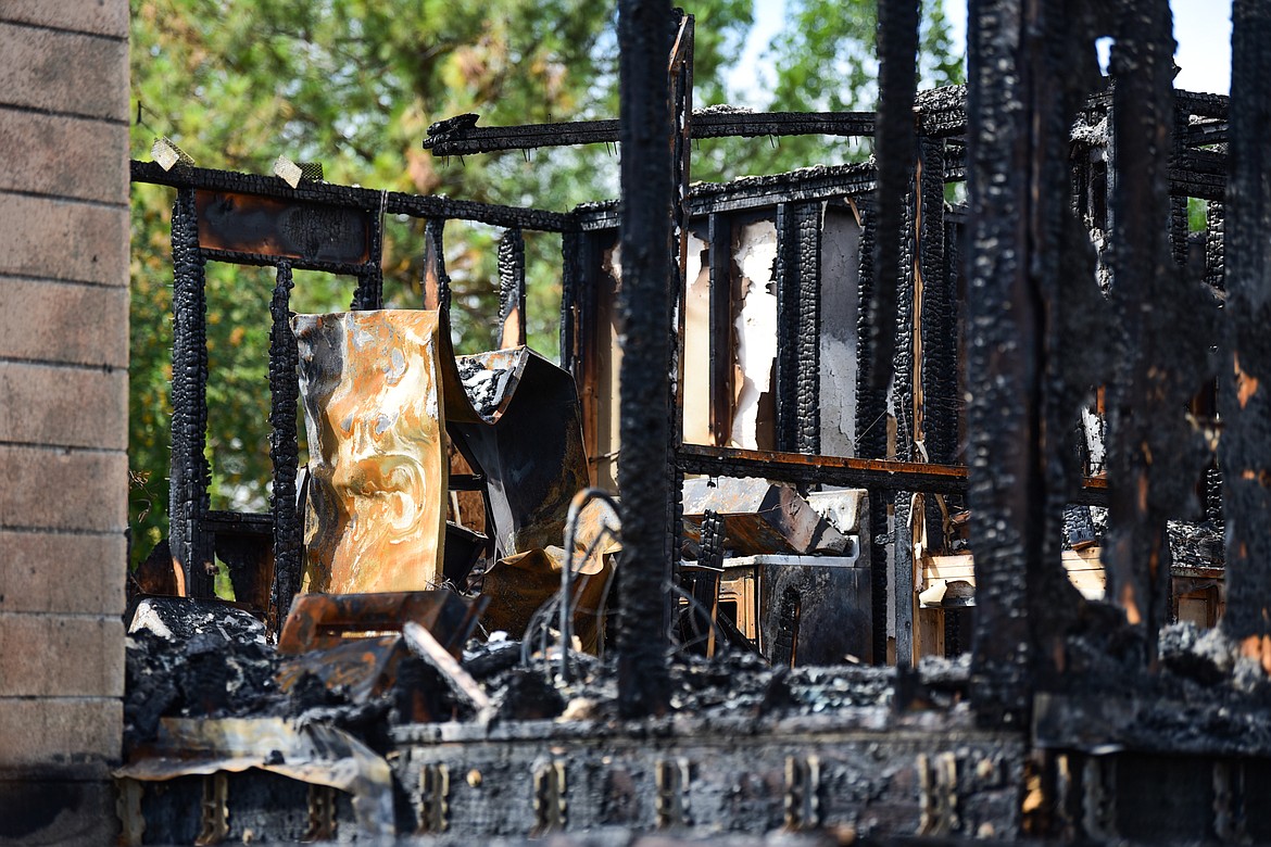 Fire damage to the home of Desiree and Brooke Brewer and Daniel Works along Tronstad Road on Saturday, Aug. 27. (Casey Kreider/Daily Inter Lake)