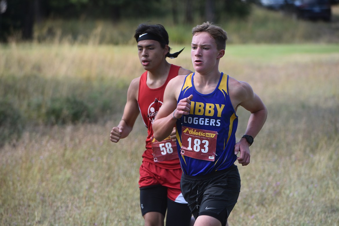 Libby sophomore Rowen Sherbo runs in the Libby Invitational Friday, Aug. 30, at Cabinet Heights Golf Course. (Scott Shindledecker/The Western News)