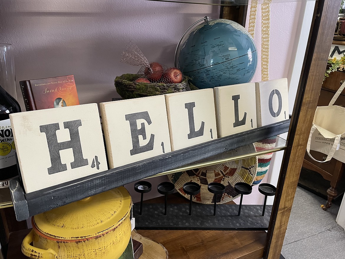 Giant Scrabble letters spell out “Hello” in a display in one of the upper floor rooms at The Favored Farmhouse.