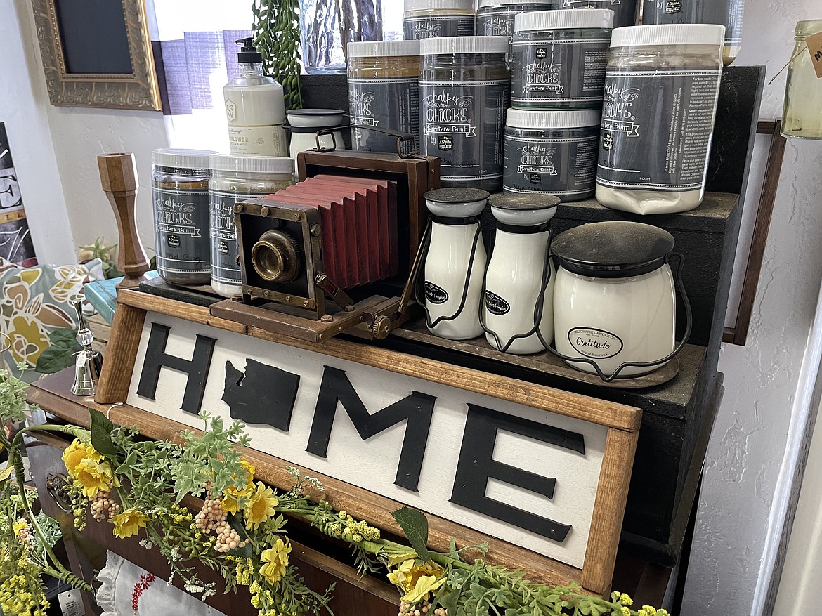 Candles and knick-knacks for sale at The Favored Farmhouse. The boutique offers a wide variety of items for customers to enjoy, including books to read while drinking a cup of coffee and eating baked goods at the boutique’s coffee shop, a place Daphne and Derek Martinez hope feels like home to their patrons.