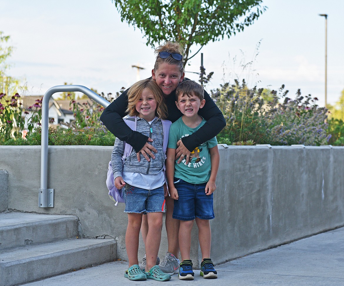 Evelyn, Ayden and Sarah Comstock smile for a picture before the first day of school at Muldown Elementary. (Julie Engler/Whitefish Pilot)