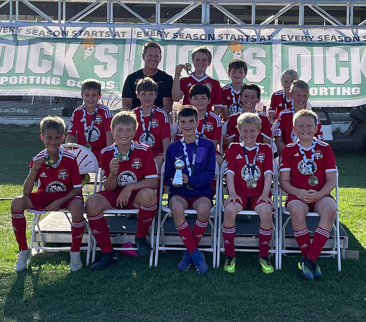 Courtesy photo
The Timbers 2011 boys soccer team won its division at the River City Challenge. In the front row from left are Ryder Quinn, Landon Smith, Damon Mysse, Bode Barton and Eli Nail; second row from left, Charlie McVey, Oliver Peters, Eli Vatsvog, Ryder Benca and Kellan Alexander; and back row from left, coach Kevin Jump, Asher Smith, Jacek Kaplan and Max Jasmin.