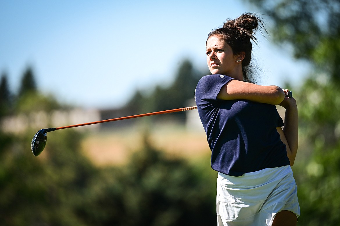 Glacier's Chloe Tanner watches her drive on the 15th tee during the Crosstown Cup at Village Greens Golf Course in Kalispell on Tuesday, Aug. 30. (Casey Kreider/Daily Inter Lake)