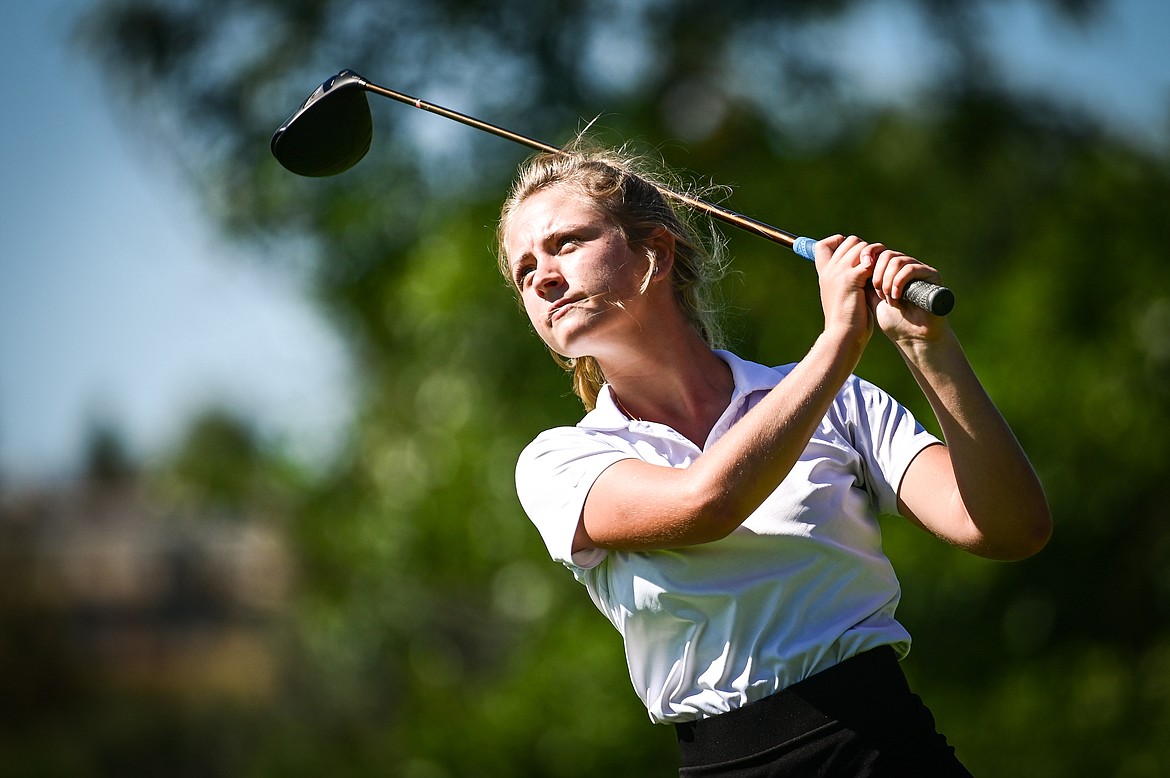 Flathead's McKinlie Murer watches her drive on the 15th tee during the Crosstown Cup at Village Greens Golf Course in Kalispell on Tuesday, Aug. 30. (Casey Kreider/Daily Inter Lake)