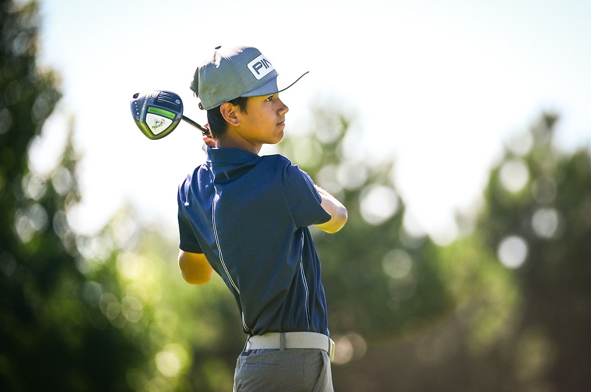 Glacier's Trevor Cunningham watches his drive on the 10th tee during the Crosstown Cup at Village Greens Golf Course in Kalispell on Tuesday, Aug. 30. (Casey Kreider/Daily Inter Lake)