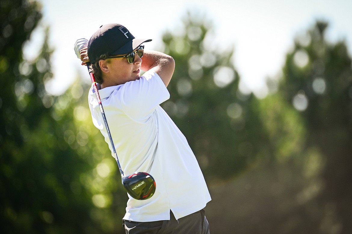 Flathead's Dylan Morris watches his drive on the 10th tee during the Crosstown Cup at Village Greens Golf Course in Kalispell on Tuesday, Aug. 30. (Casey Kreider/Daily Inter Lake)