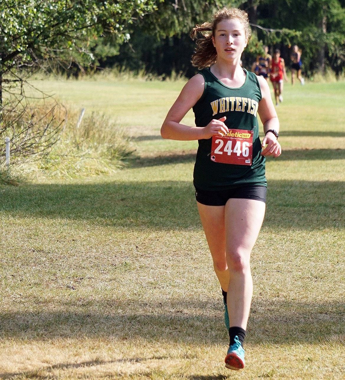 Whitefish junior Hazel Gawe earns a top-20 position at the Libby Invite on Friday. (Matt Weller photo)