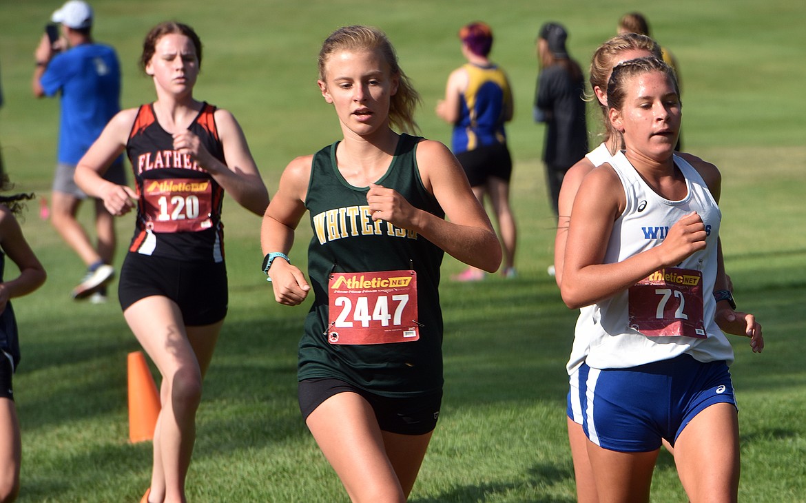 Whitefish's Morgan Grube races at the Libby Invite on Friday. (Scott Shindledecker/Western News)