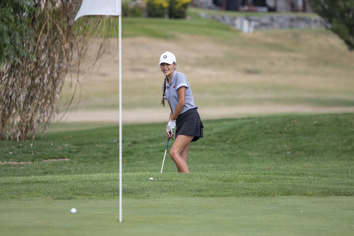 Ronan Maiden Alyssa Pretty On Top hits the green with her chip shot during the Ronan Invitational at Mission Mountain Golf Course on Thursday.