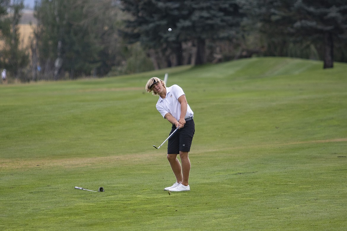 Polson Pirate Christian Lund chips his way onto the green.