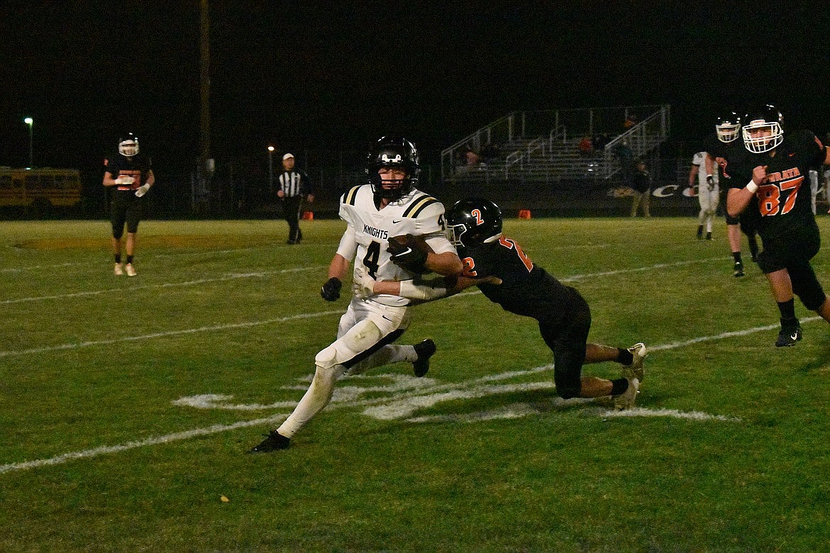 Ephrata's Joshua Green makes a tackle during a game against Royal last season.