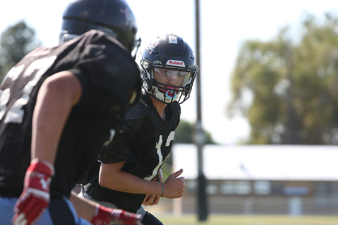 ACH’s Cody Allsbrook looks on past a defender during a pursuit drill.