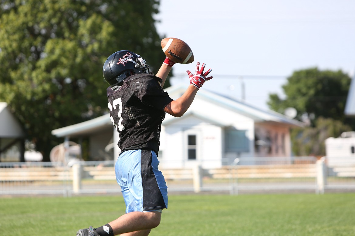 Receivers work during practice by running the different routes of the route tree.