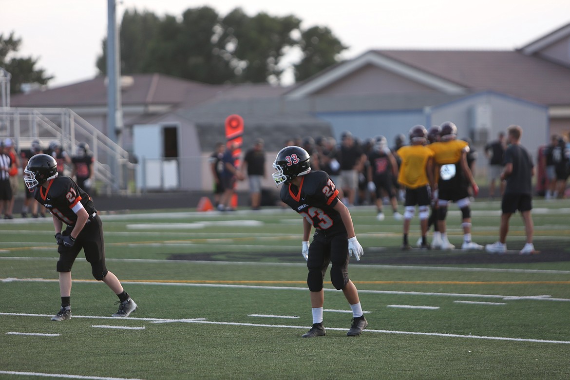 Ephrata receivers get set on the line of scrimmage.