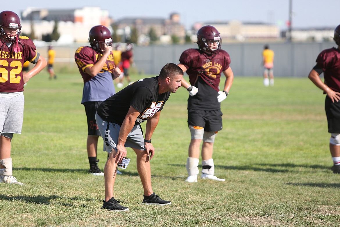 Moses Lake head coach Brett Jay looks on during a team session of practice.