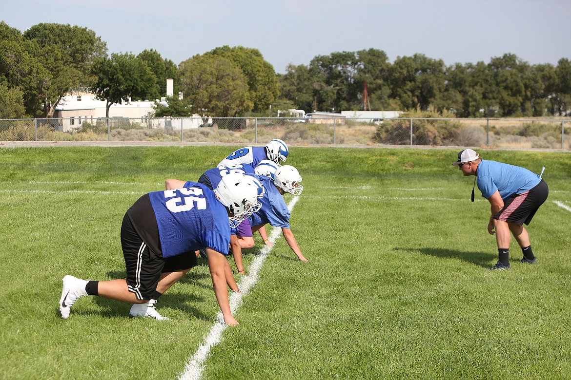 Soap Lake players line up during a defensive line drill.