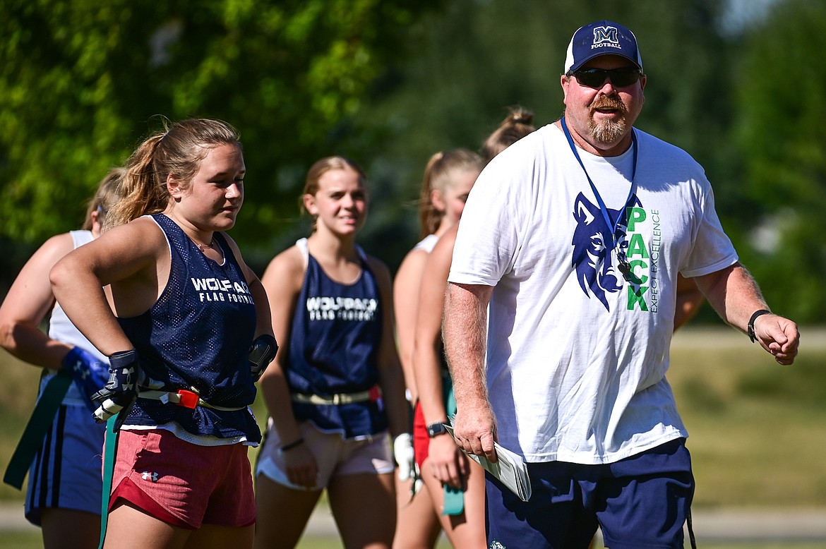 Glacier flag football head coach Mark Kessler leads the team during a practice outside Glacier High School on Wednesday, Aug. 31. (Casey Kreider/Daily Inter Lake)