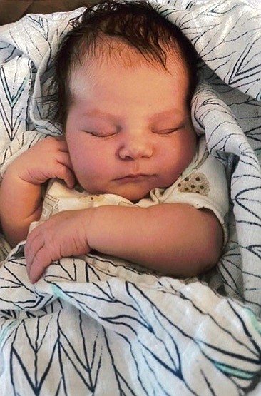 Emily (Brown) Lopes, formerly of Troy, and George Lopes, of Reno, Nevada, announce the birth of a beautiful baby girl on May 14, 2022. Liv Katherine weighed nine pounds and was 21 inches long.