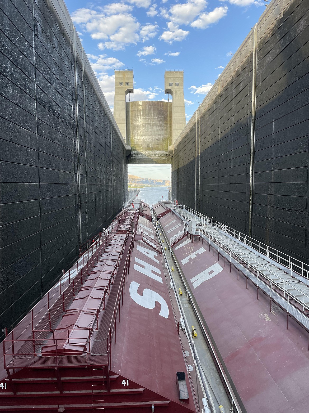 Inside the locks of the John Day Dam. It takes about 30 minutes for the tow — the name given to the assembly of tugboat and barges — to transit a dam lock going downstream.
