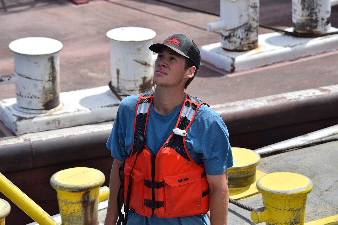 Colby Glaze listens as Captain Troy Moore gives him some orders and make some suggestions. Glaze, a midshipman at the California Maritime Academy in Vallejo, spent several weeks as a trainee with Shaver Transportation during the summer. In order to help alleviate a shortage in personnel, Shaver’s vice president for upriver grain operations, Phil Trochim, said the company works closely with maritime academies like CMA to provide students and cadets opportunities to learn about river hauling work.