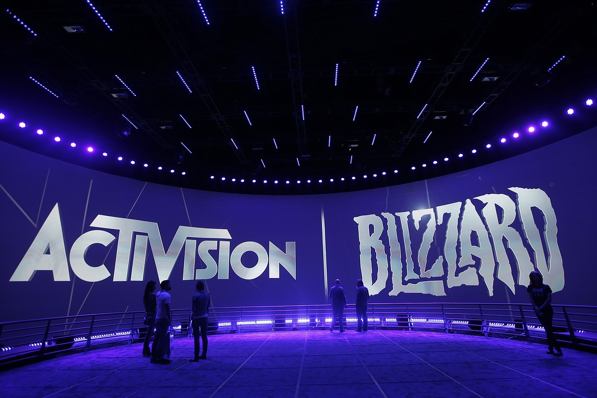 The Activision Blizzard Booth is shown on June 13, 2013, during the Electronic Entertainment Expo in Los Angeles. Microsoft’s plan to buy video game giant Activision Blizzard for $68.7 billion could have major effects on the gaming industry, transforming the Xbox maker into something like a Netflix for video games by giving it control of many more popular titles. But to get to the next level, Microsoft must first survive a barrage of government inquiries from various countries. An upcoming decision from the United Kingdom to close or escalate its antitrust probe is expected Thursday, Sept. 1, 2022. (AP Photo/Jae C. Hong, File)