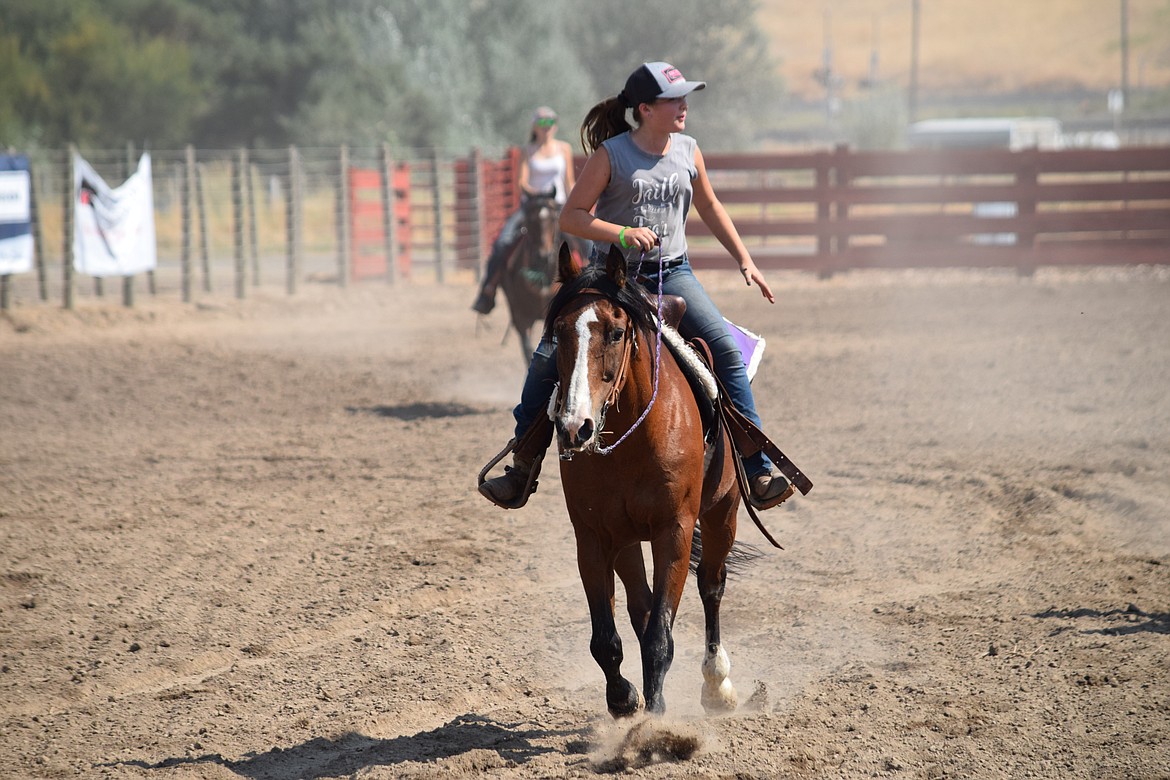 Addie Harold, 13, of Ritzville, works her horse in the Ritzville Rodeo arena on the first day of the Wheat Land Communities’ Fair on Thursday.