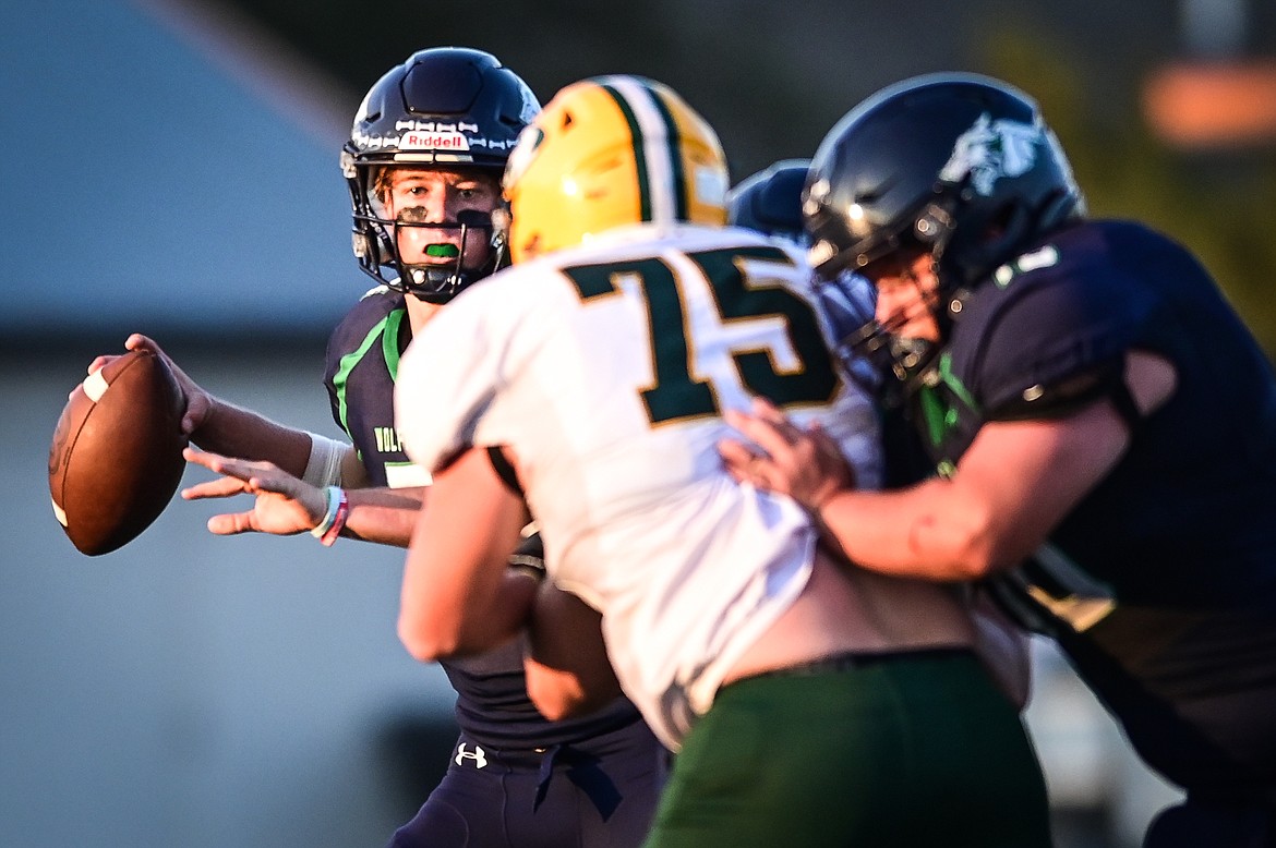 Glacier quarterback Gage Sliter (7) drops back to pass in the first quarter against Great Falls CMR at Legends Stadium on Friday, Sept. 2. (Casey Kreider/Daily Inter Lake)