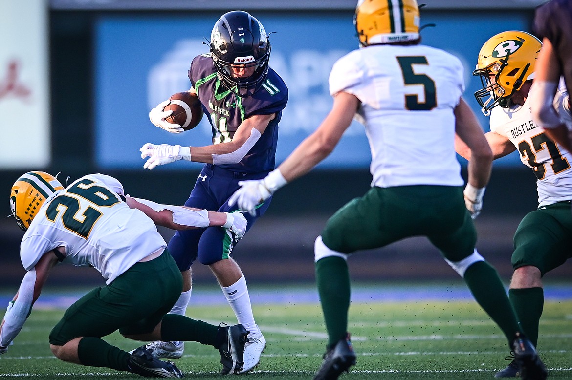 Glacier wide receiver Rhett Measure (11) picks up yardage after the catch against Great Falls CMR at Legends Stadium on Friday, Sept. 2. (Casey Kreider/Daily Inter Lake)