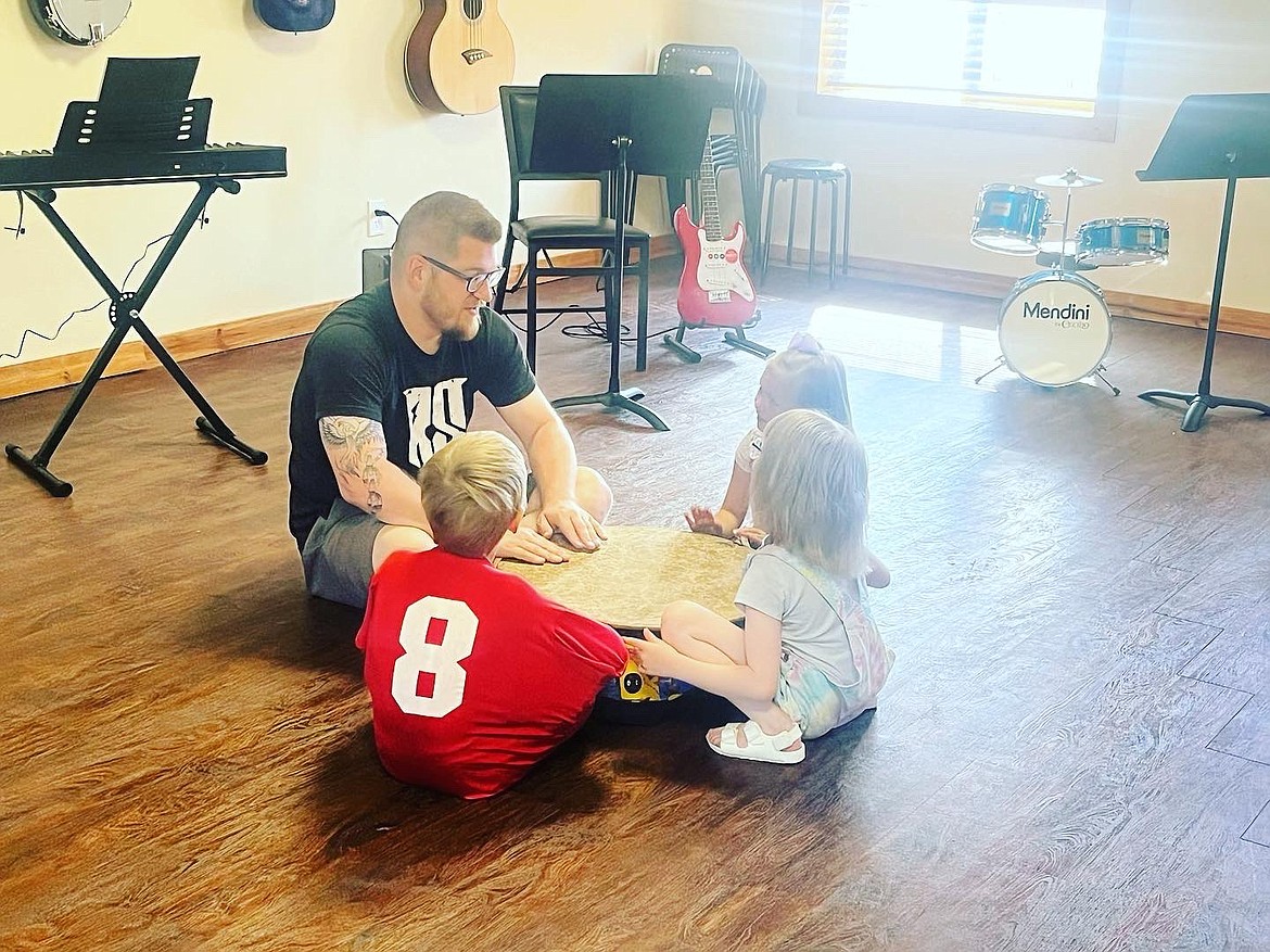 Jacob Burrows of North Idaho Rock School with a group of students.