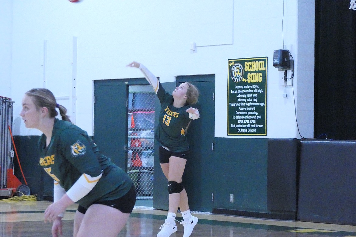 St. Regis freshman Shelby Simkins winds up a serve against the Darby Tigers during their match Saturday in St. Regis.  (Chuck Bandel/MI-VP)