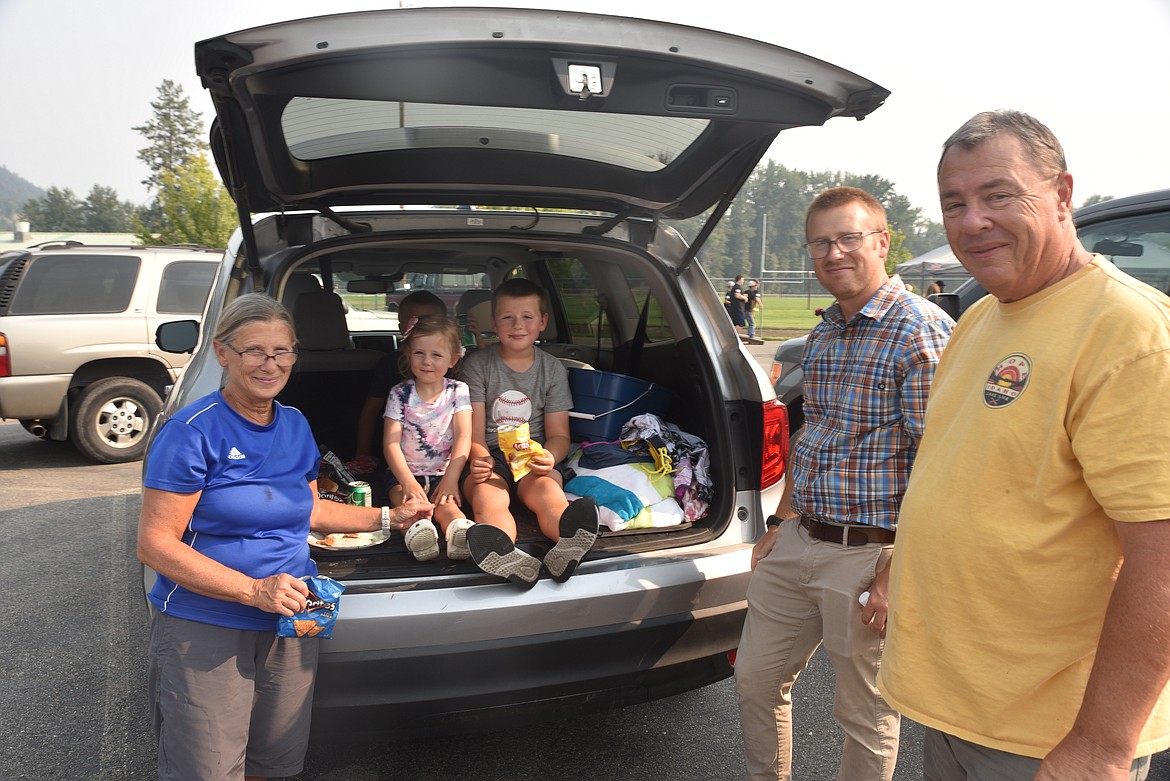 The Wells family, Darlene, Claire, Thomas, Ryan, Mike and Don, enjoyed tailgating before the Troy home football game on Friday, Sept. 2. (Scott Shindledecker/The Western News)