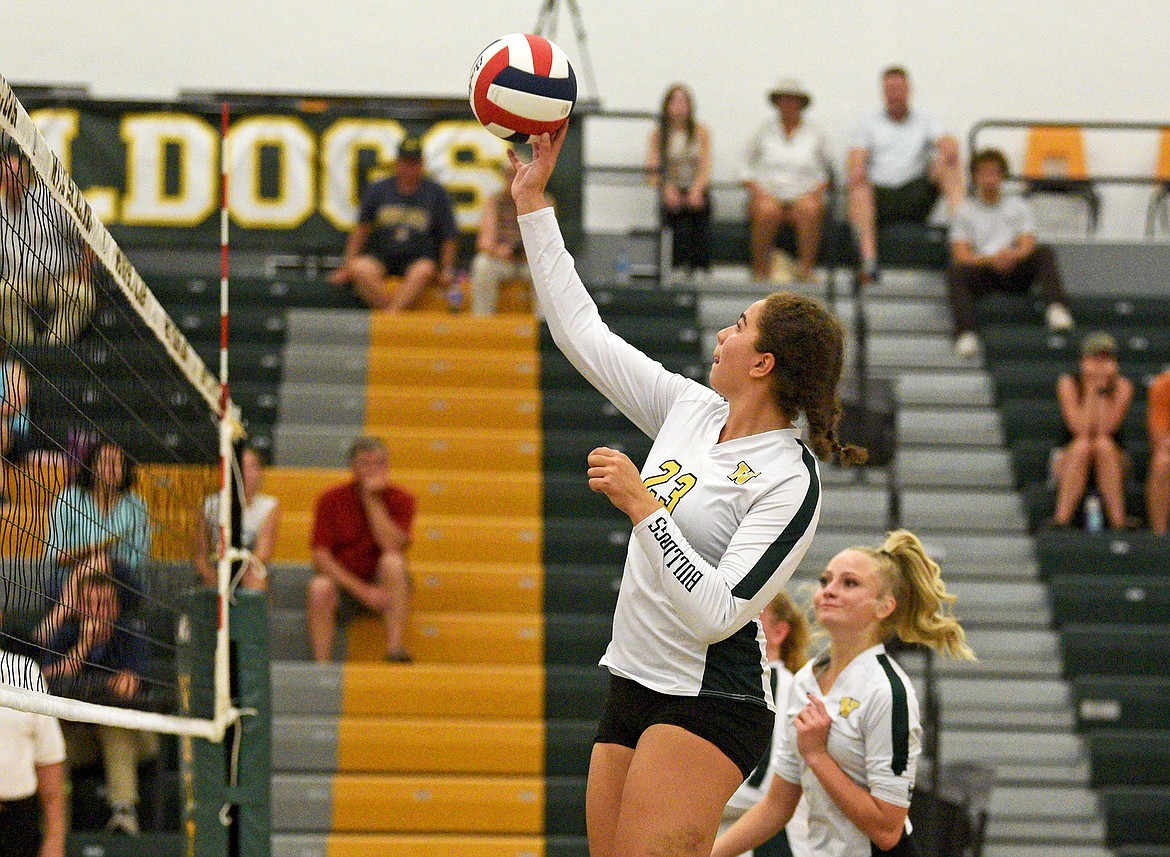 Bulldog sophomore Isabella Hartwig strikes the ball over the net against Stillwater on Thursday at Whitefish High School. (Whitney England/Whitefish Pilot)