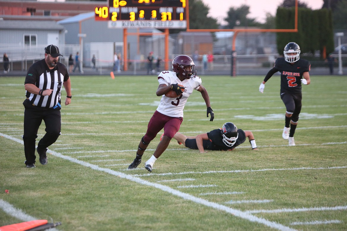 Moses Lake receiver/defensive back Joel Middleton returns a loose ball 70 yards for a touchdown in Moses Lake’s 21-14 win over Ephrata.