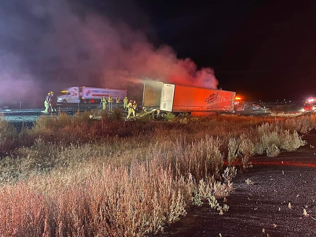 The remains of a semi-tractor trailer involved in a head-on collision on I-90 east of Moses Lake on Saturday when the driver of a pickup truck drove west on an eastbound lane of the interstate.